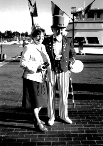 Naturalization ceremony. Uncle Sam with a woman participant, Baltimore, July 1986. Source: United States Customs and Immigration Services History Office and Library.