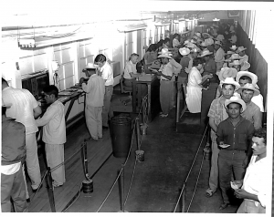 Processing line for Braceros at Immigration, El Paso, Texas, 1955. Source: United States Customs and Immigration Services History Office and Library.